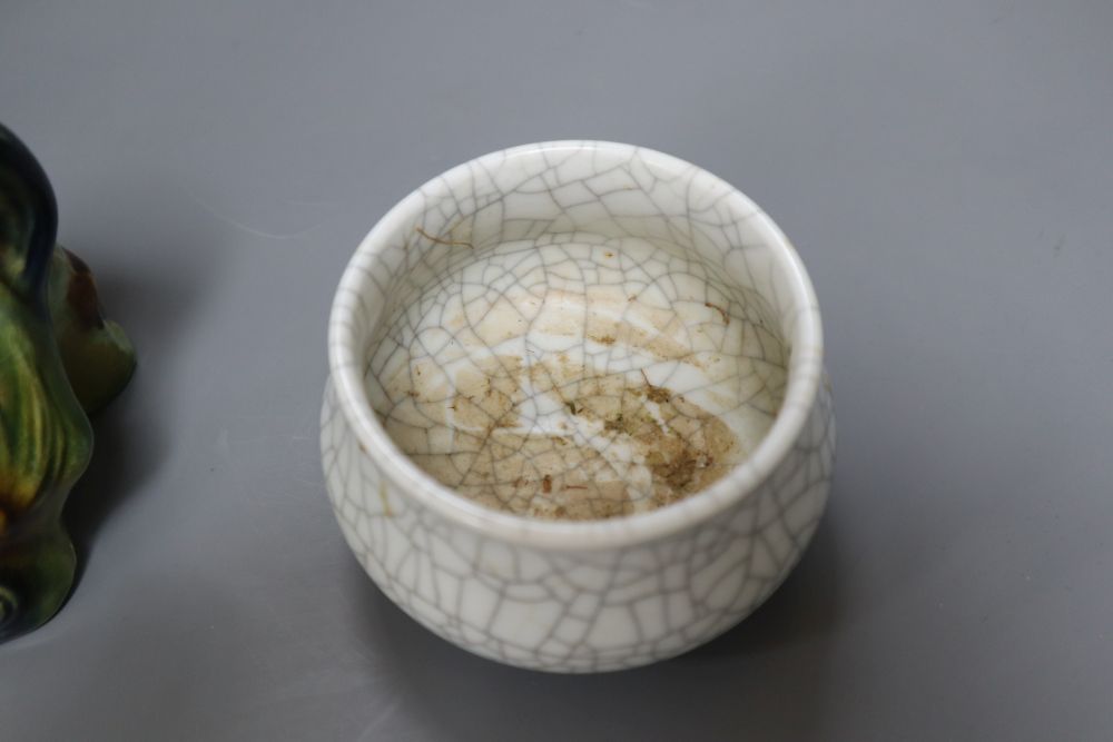 A Chinese powder blue vase, 23cm, Chinese crackleware bowl, 10cm diameter and an earthenware Buddhistic lion